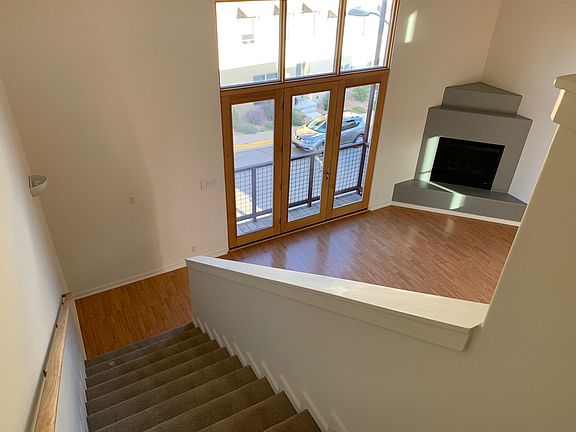 View from third floor loft to living room