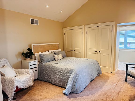 Bedroom with queen bed and lots of closet space