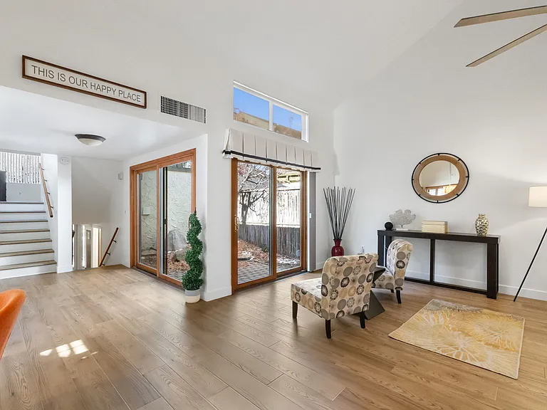 The sitting area overlooks a serene private atrium.