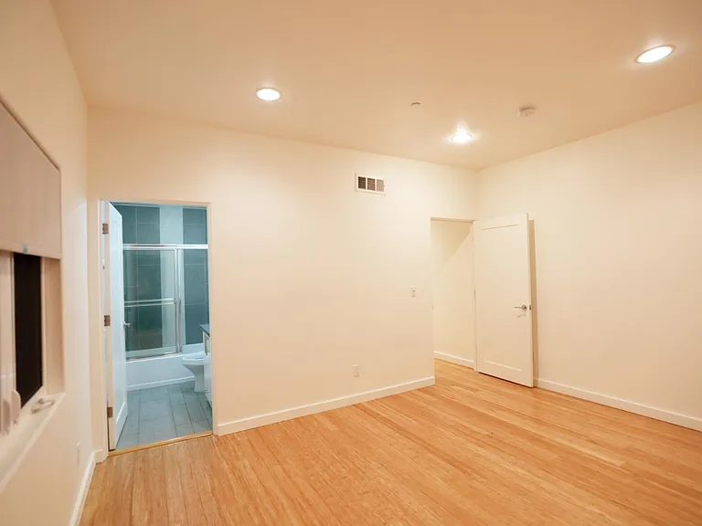 Rear Bedroom Entrance Door & Bathroom