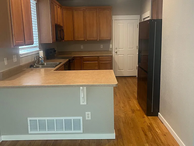 View of kitchen from dining right