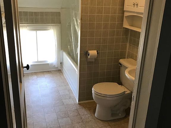 New vinyl flooring in bathroom.  Very clean.