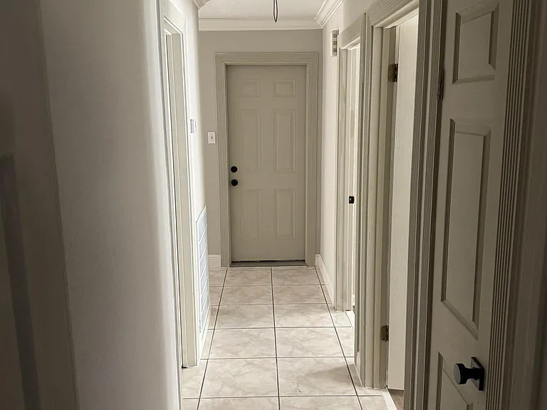 Access to the garage from bedroom hallway.