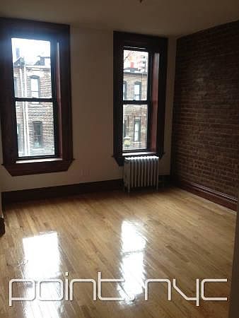 2nd image of 114 E 4th St APT 3