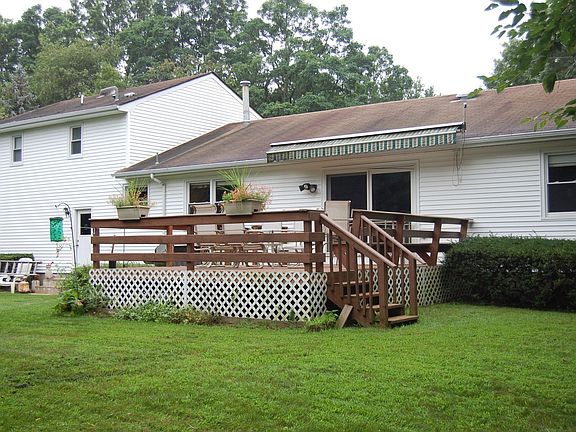Custom deck with seating and retractable awning