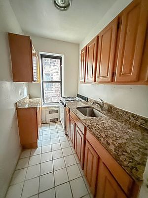 1st image of 8615 Elmhurst Ave #4G