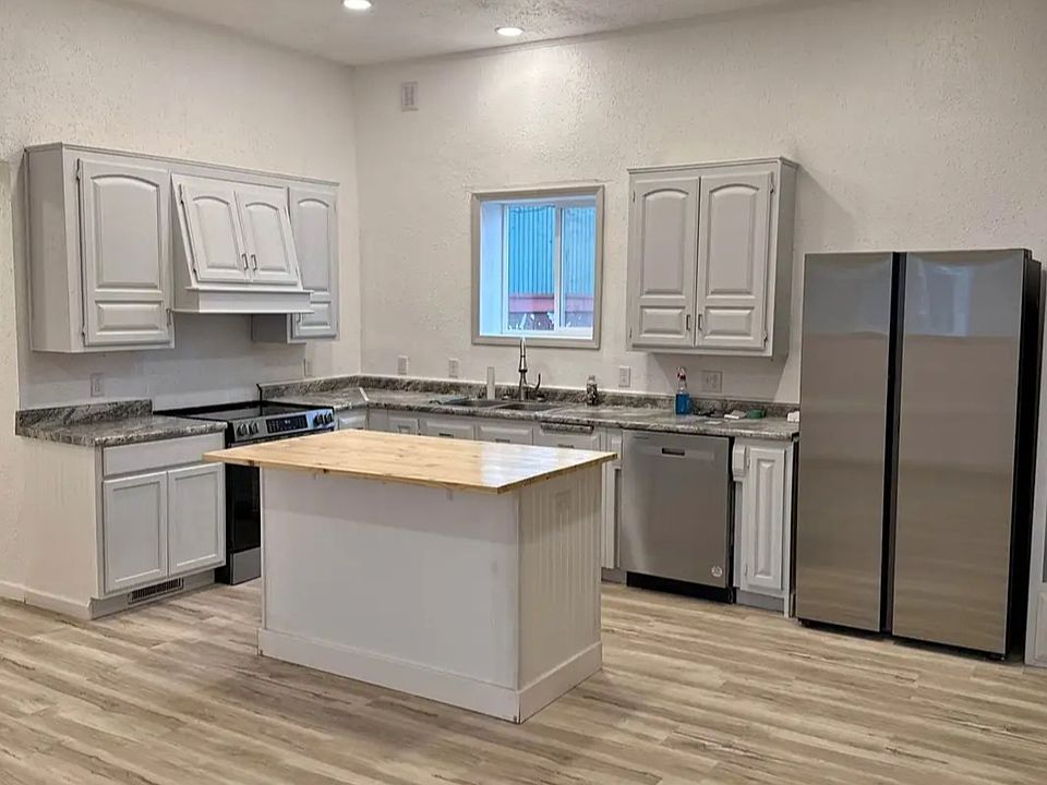 Very large kitchen with beautiful high ceilings throughout.