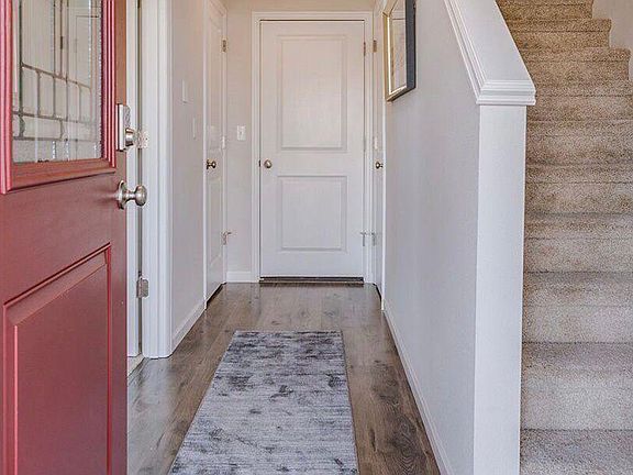 Entrance; bedroom on the left, garage straight ahead, stairs to level two.