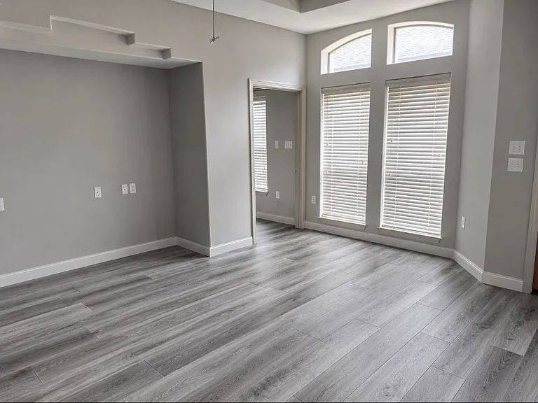 DINING/LIVING ROOM LARGE WINDOW CROSS AND TV NITCH