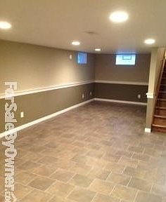 Finished Basement/Rec Room
						:
						Tile floors