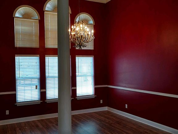 Formal dining area as you come in the front door opens into spacious living room