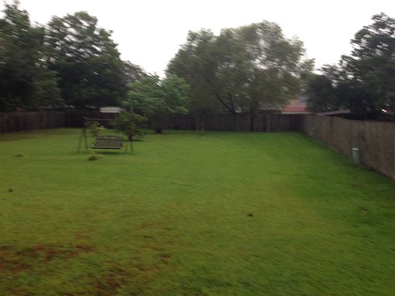 privacy fenced backyard