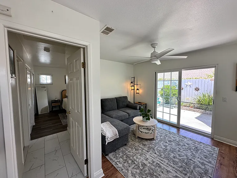 Living room and doorway to bedroom
