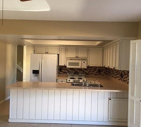 kitchen opens to family room