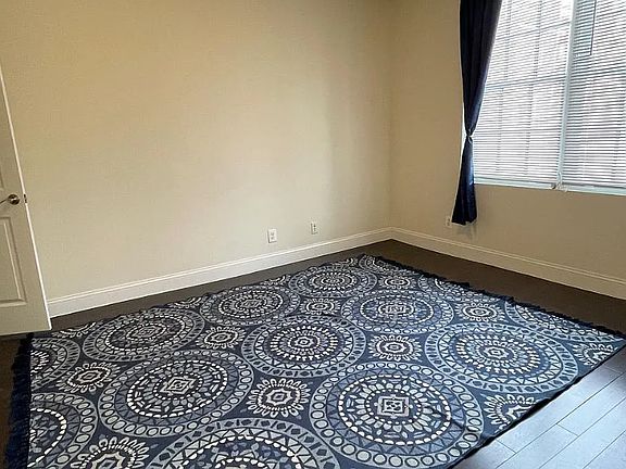 Bedroom with large windows, Built-in-Closets, and an accessible Luxury ensuite bathroom with a walk-in Soaking Tub