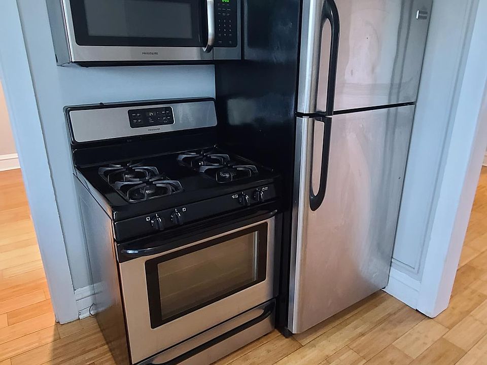 Kitchen with granite counters, stainless steel appliances and dishwasher
