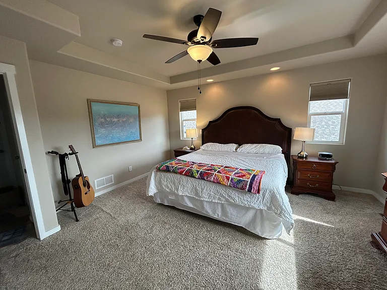 Another view of the large primary bedroom which has its own 5 piece on suite bathroom.