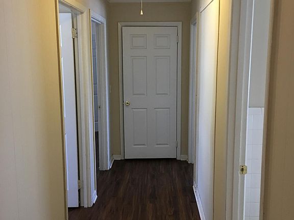 Main hallway that leads to 3 bedrooms