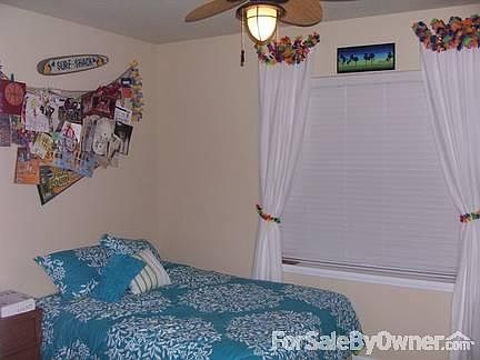 Front Bedroom
						:
						With ceiling fan and custom closet.
