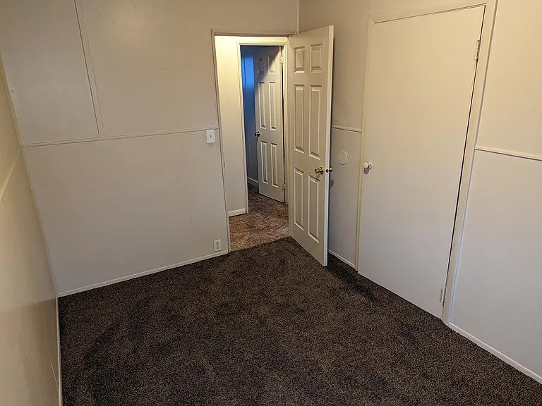 Bedroom closets to the living room