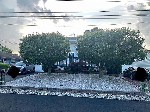 2 driveways with yard access