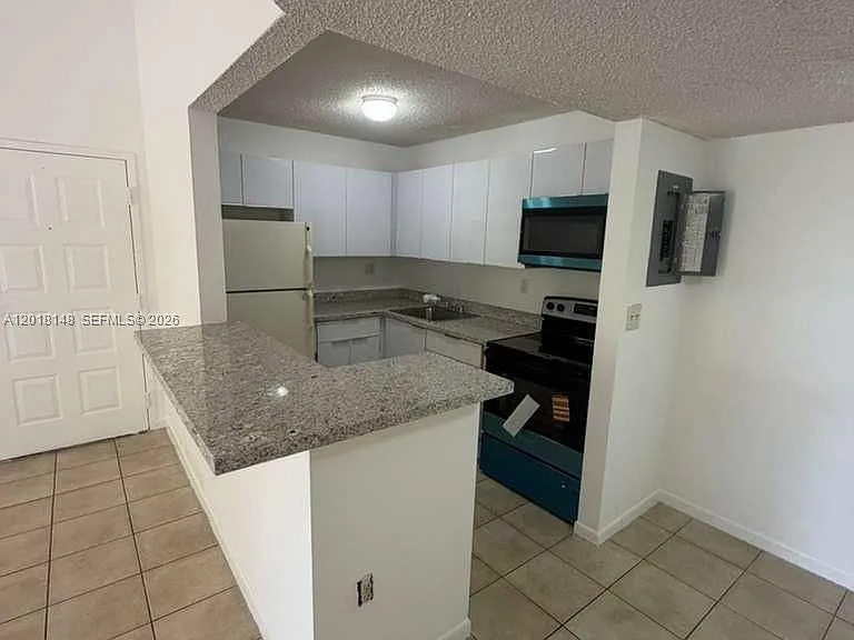 7160 NW 179th St #310 — Photo 4