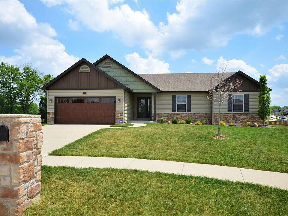 Welcome to 227 Hartford Glen!  This beautiful home has so many upper end features.  Located on a great street at the end of a cul de sac.  The lot is so large and enclosed with Kroy vinyl fencing.  Upgraded vinyl siding with decorative stone trim, wood gr