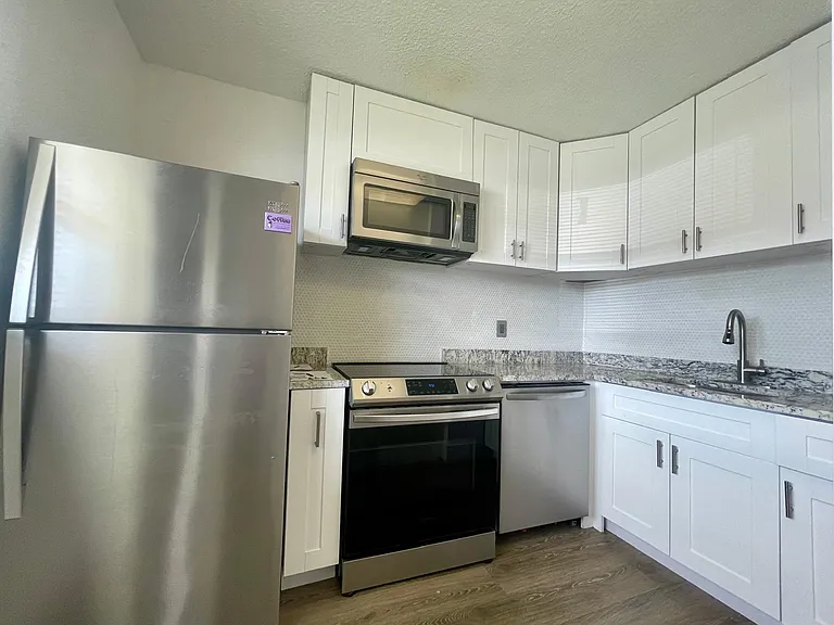 651 NW 42nd Ct #118 — Photo 10