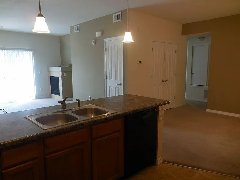 Double sink with garbage disposal. New stainless steel dishwasher coming! Open concept to living and dining room