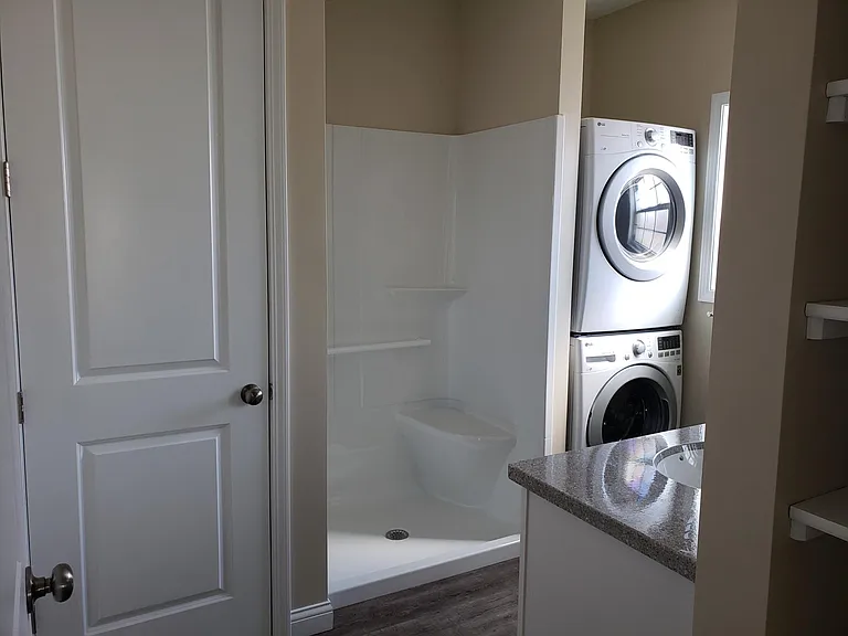 Full Size Quality LG Stack Washer/Dryer. 48" Wide Shower with Built-In Seat and Factory Grab Bars