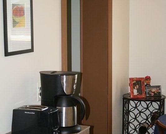 Additional bar area in kitchen for storage and counter space