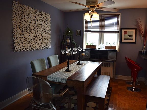 Dining area could be turned into an office with the harbor/city view, or a workout area