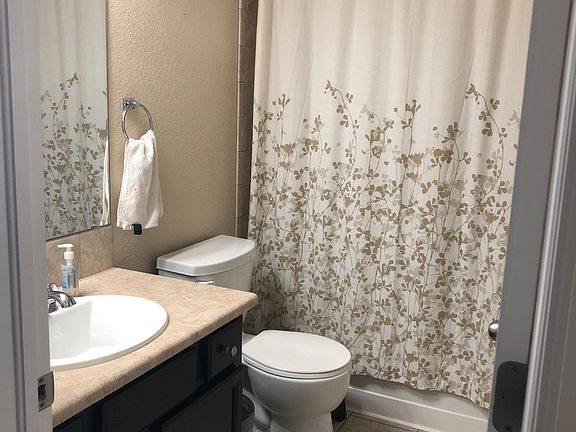 Guest bathroom upstairs that shares two bedrooms