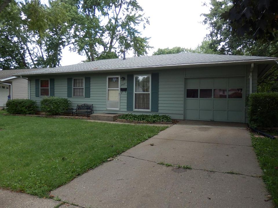 Front of house with attached single car garage