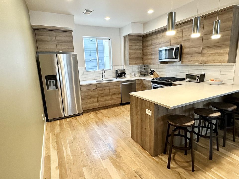 Spacious and modern kitchen with all new appliances and plenty of storage space.
