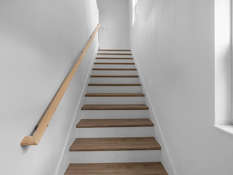 Stairs leading up to the unit.