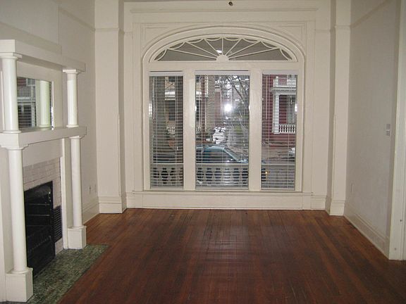 Living room with floor to ceiling windows