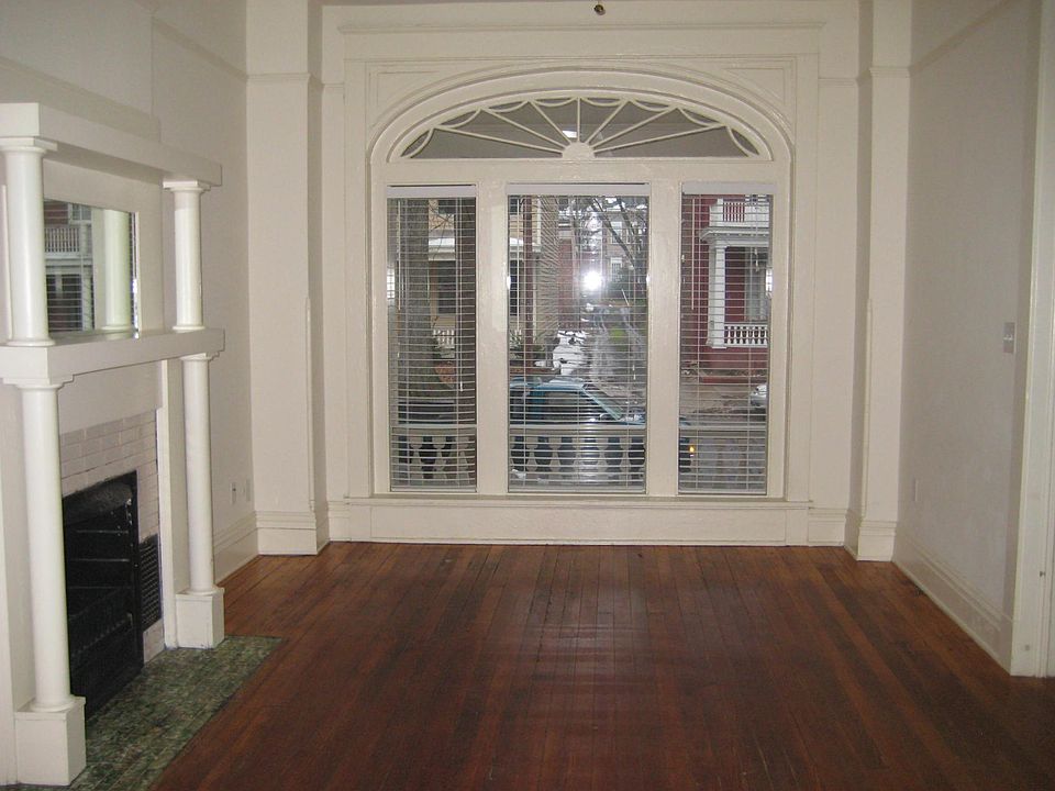 Living room with floor to ceiling windows