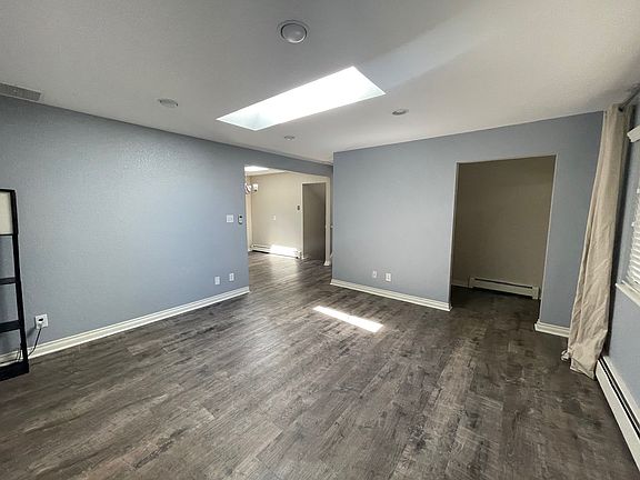 Living room w/sky light