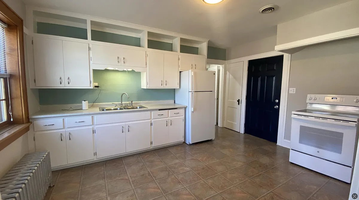 Building Photo - 1802 E Howard Ave #3