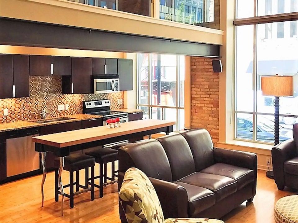 Beautiful living room with open concept and 30 ft ceiling