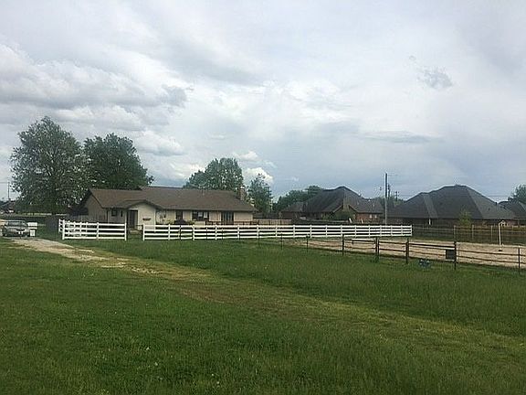 Backyard and outdoor arena.