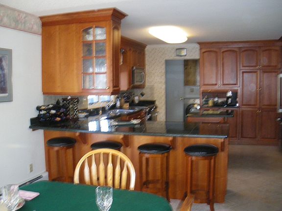 Cherry cabinets w/ granite counters - work island