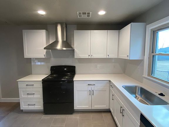 New Electric Range and Dishwasher