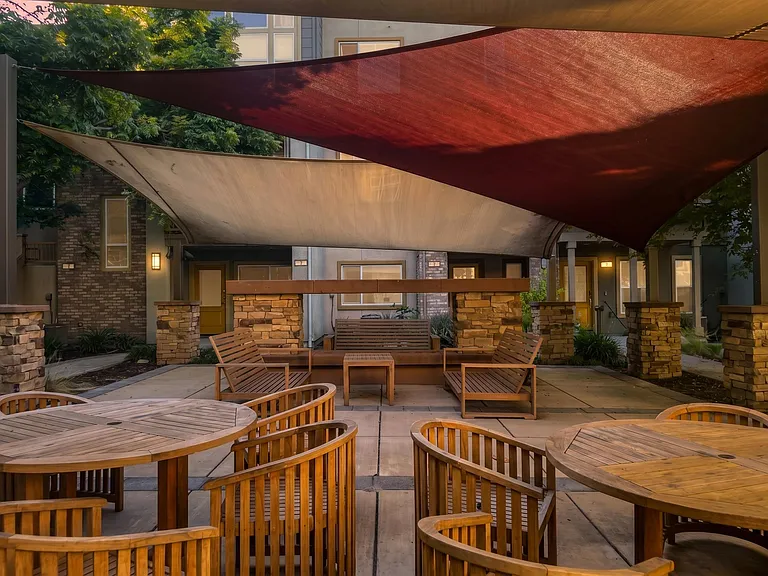 Community common area with bbq and kids play area