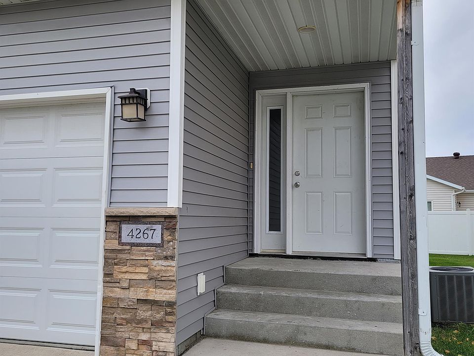 4 bedroom 3.5 bathroom twin home with attached garage