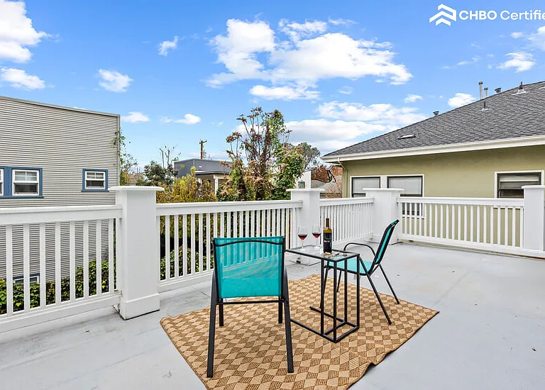 Upstairs huge deck for primary suite overlooking neighbors