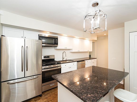 4th image of 9711 Dickens Ave