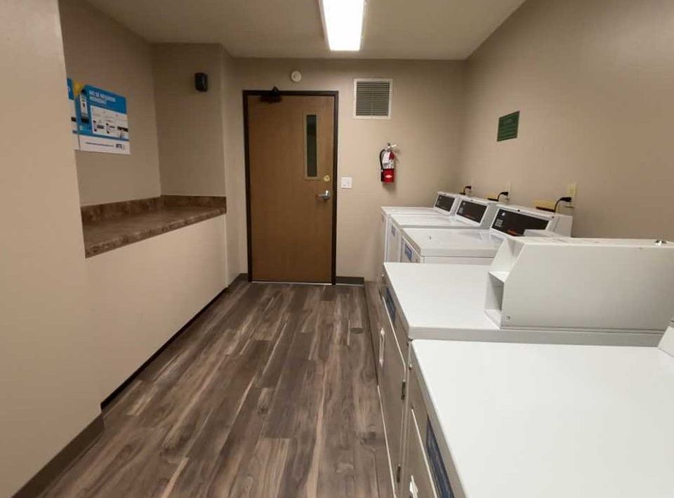Every floor has their own laundry room.
