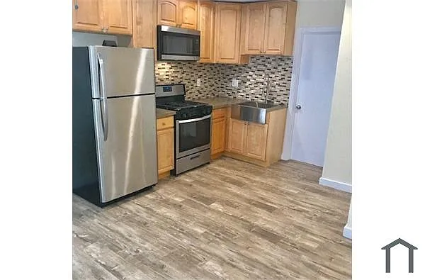 Building Photo - 1103 W 64th St #102